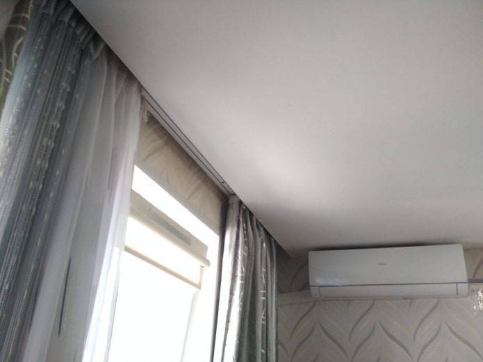 hidden curtain rod behind a stretch ceiling