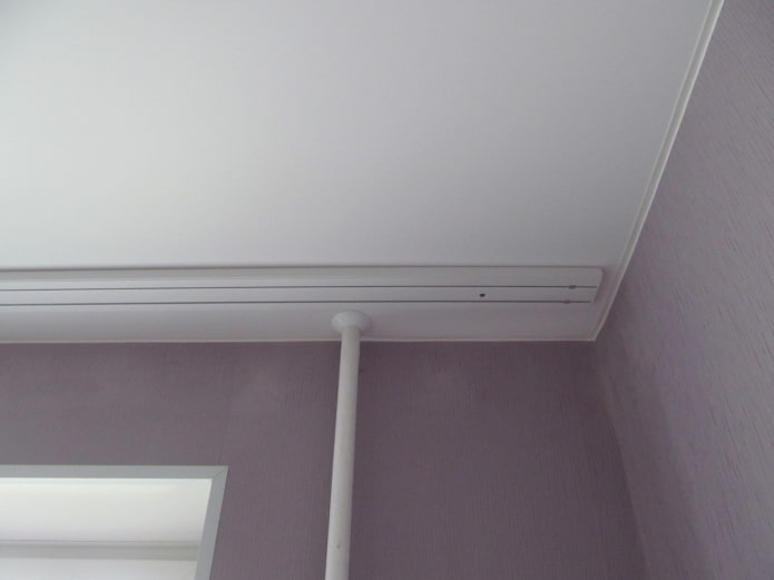 curtain rod on a stretch ceiling