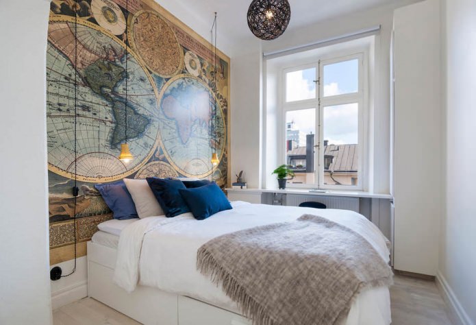 world map at the head of the bed