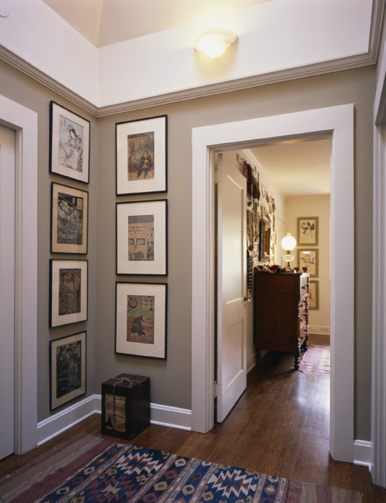 paintings in the corner of the hallway