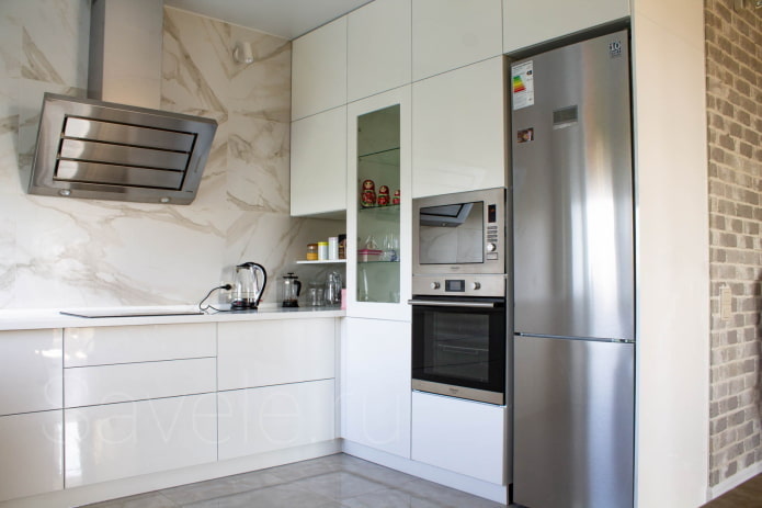 refrigerator in the interior of a small kitchen