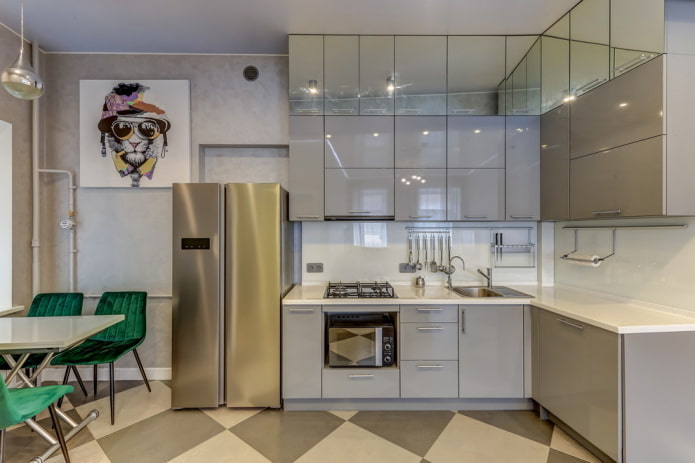 refrigerator in the interior of a corner kitchen