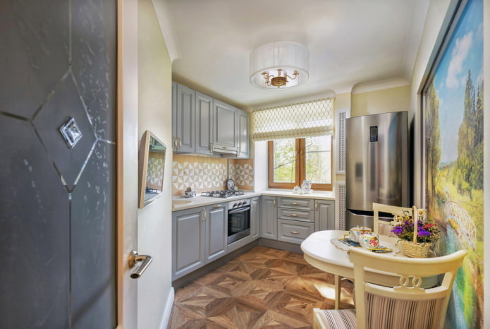 refrigerator opposite the door in the kitchen interior