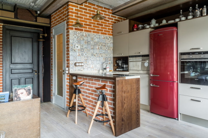 refrigerator in the middle of the kitchen set