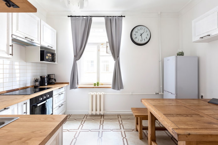 refrigerator in the corner of the kitchen interior