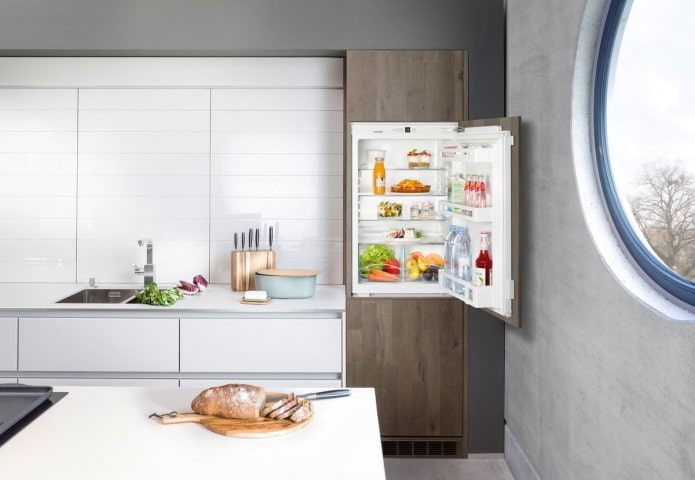 refrigerator built into the kitchen interior