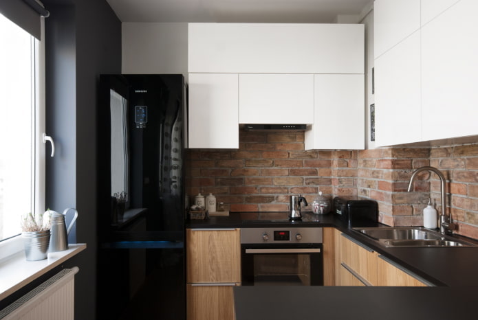 refrigerator in the interior of the U-shaped kitchen