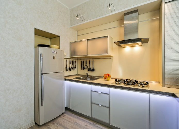 refrigerator in the interior of a small kitchen