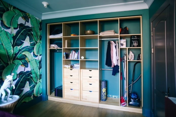 Ironing board in a wardrobe compartment