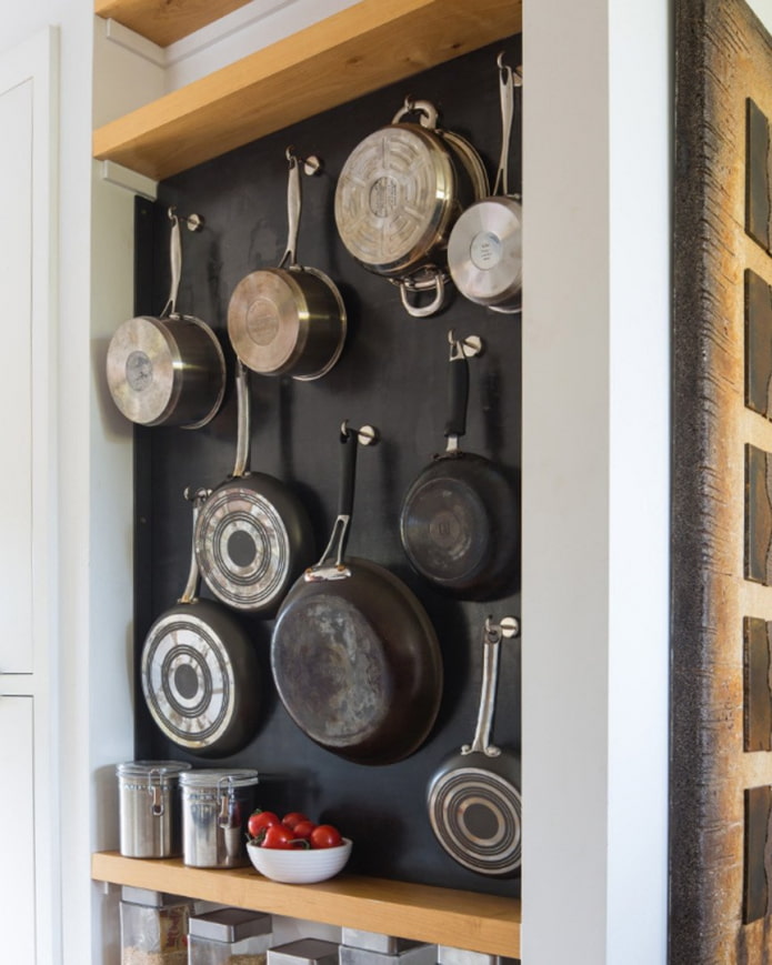 Frying pans on the wall
