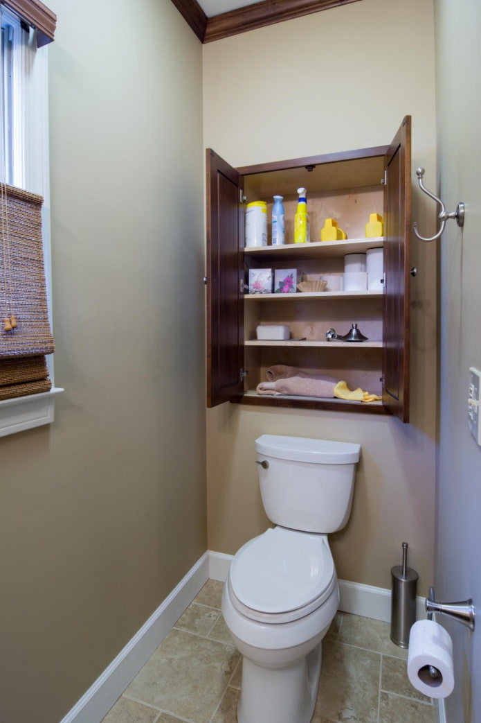 cabinet above the toilet