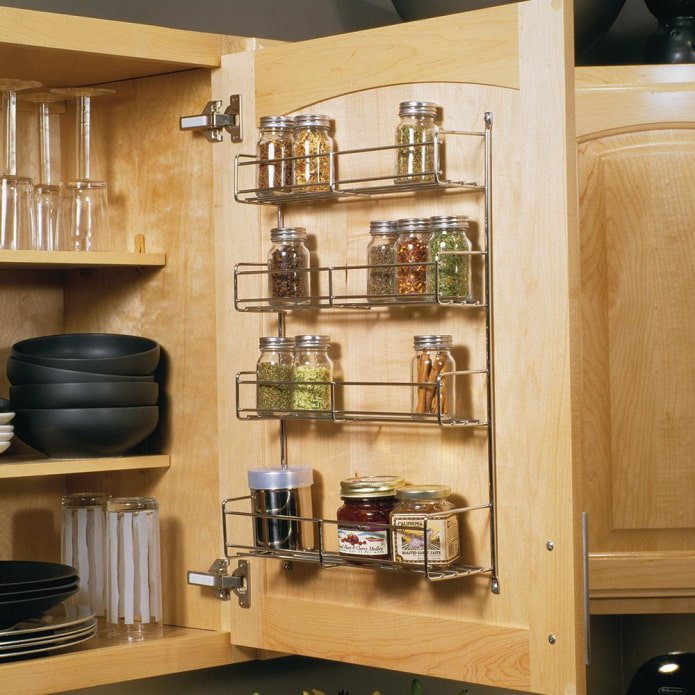 shelves on the door with tea in jars