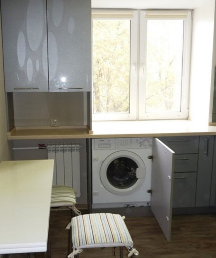 washing machine in the kitchen in a Khrushchevka
