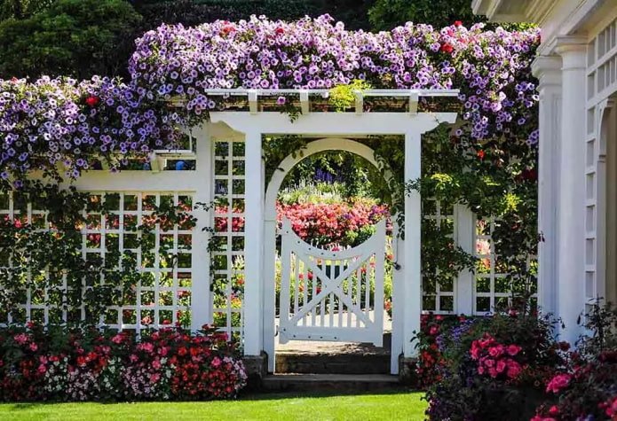 pergola arch with a flowerbed