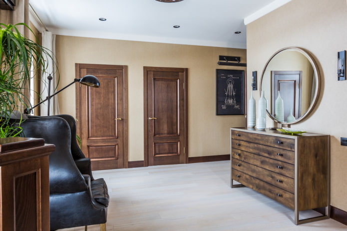 chest of drawers with a mirror in the interior of the hallway