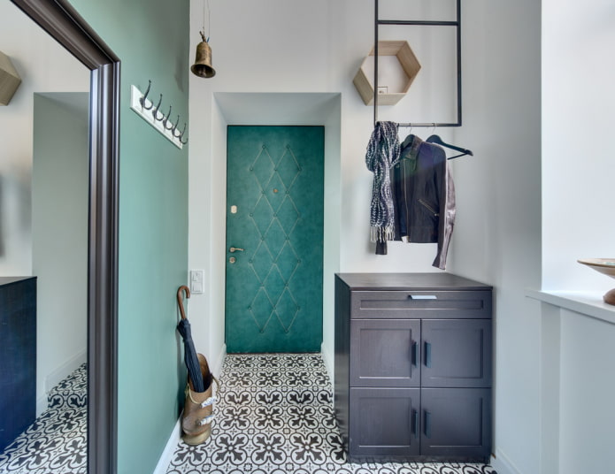 chest of drawers in the interior of a small hallway