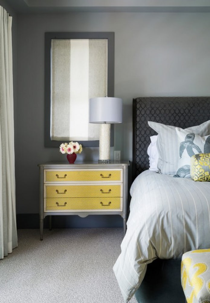 mirror above the chest of drawers