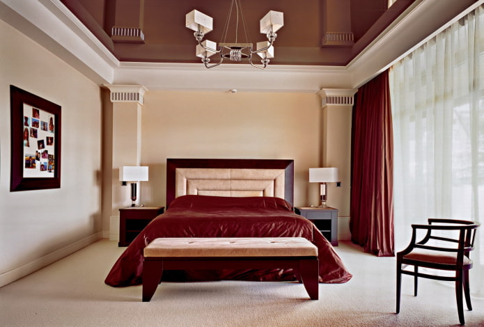 brown stretch ceiling with burgundy curtains