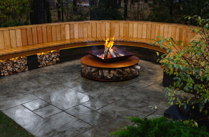 storing firewood near an outdoor fireplace