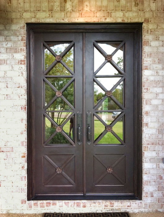 entrance door with forging and glass