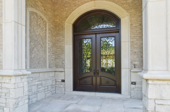 entrance door with forged iron and glass