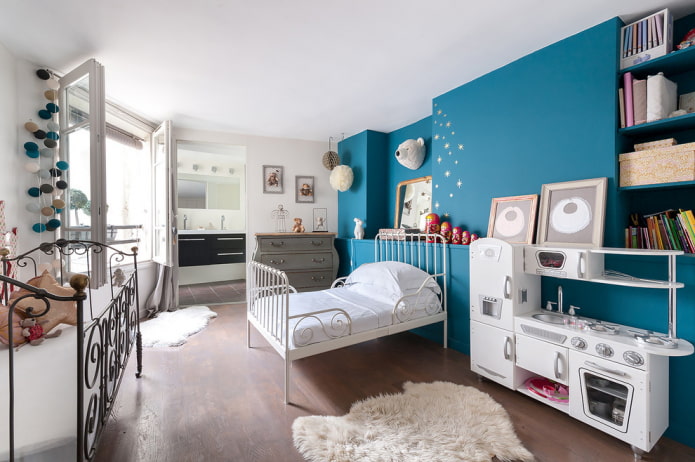 a wrought iron bed in a children's interior