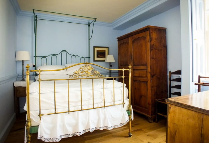 bed with golden forging