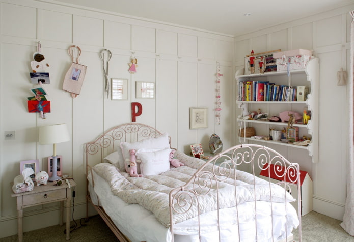 a wrought iron bed in a children's interior