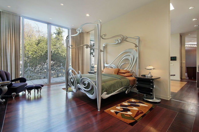 forged bed in the bedroom in the Art Nouveau style