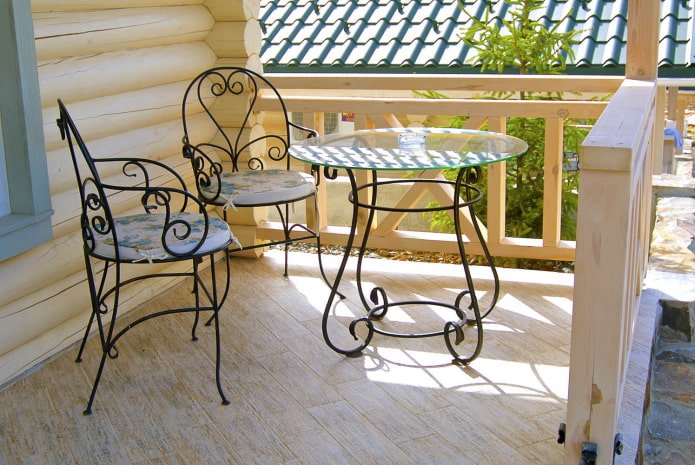 forged outdoor table on the veranda