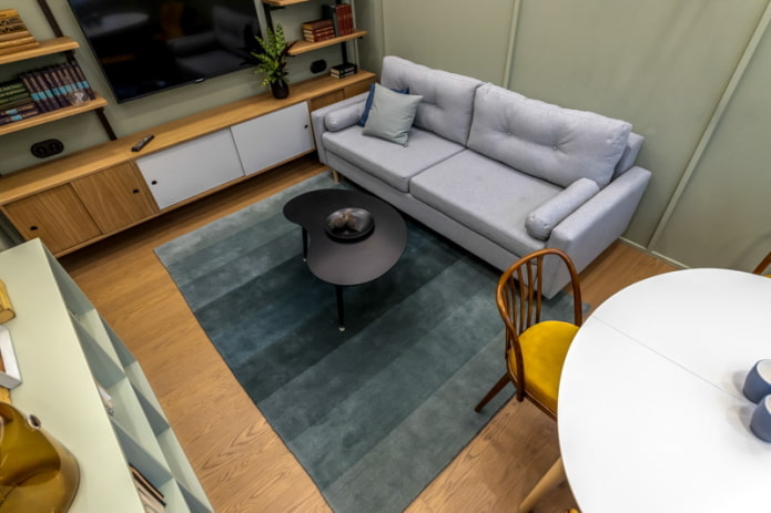location of the carpet in the living room