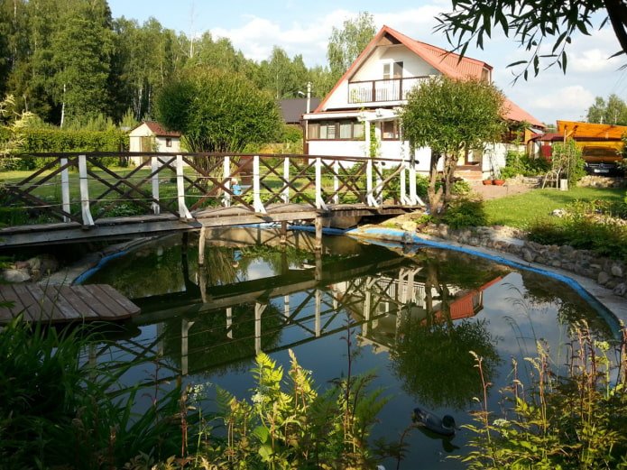 Plot with a pond and a bridge