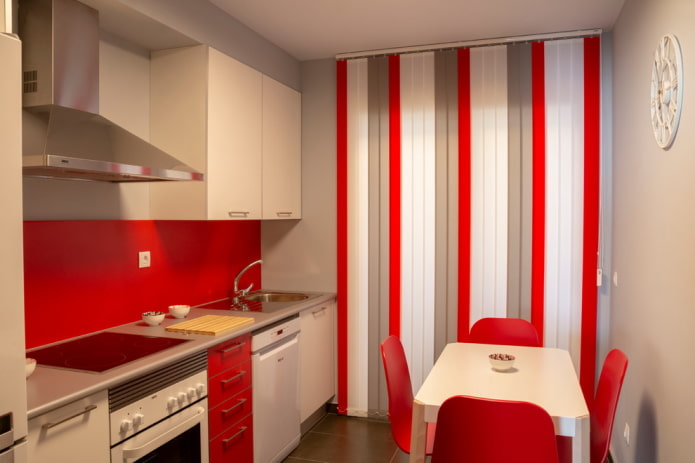 curtains in the kitchen interior in red tones