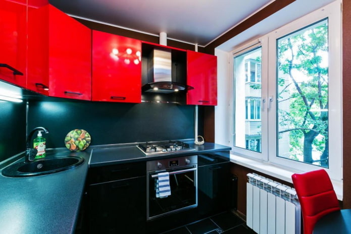 Red and black kitchen in a Khrushchev building