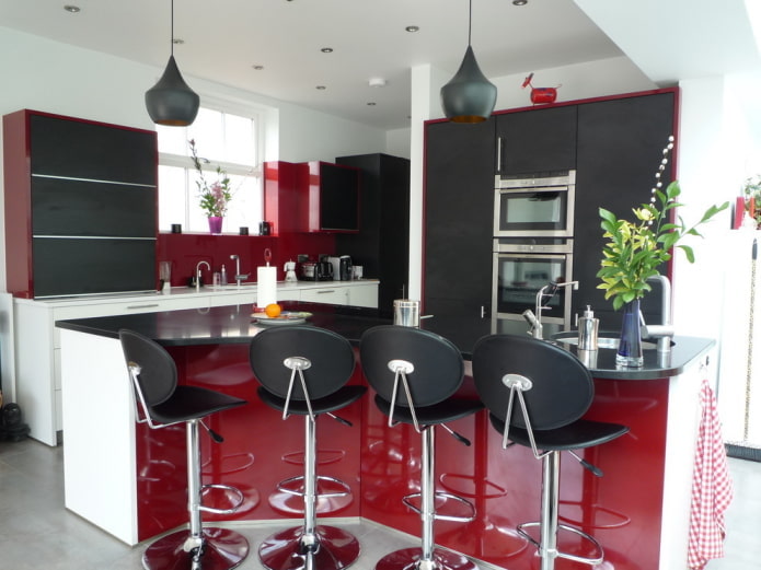 Black and cherry kitchen with a white background