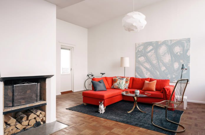 pillows on a red fabric sofa