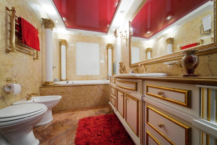 combined bathroom with a large mirror