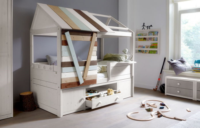 house-shaped bed with drawers in the nursery