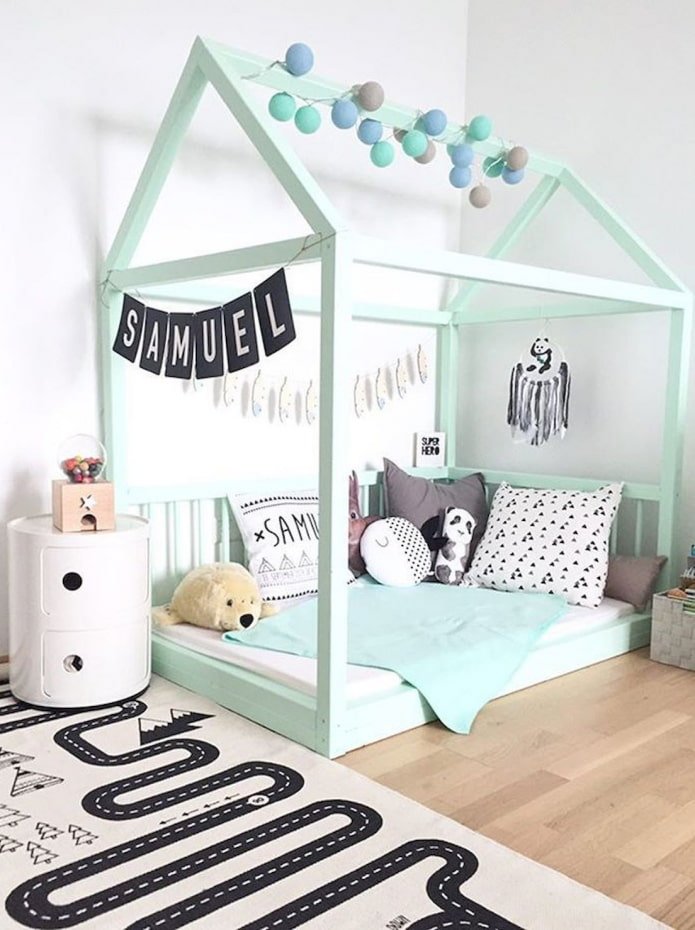 house-shaped bed in a children's room