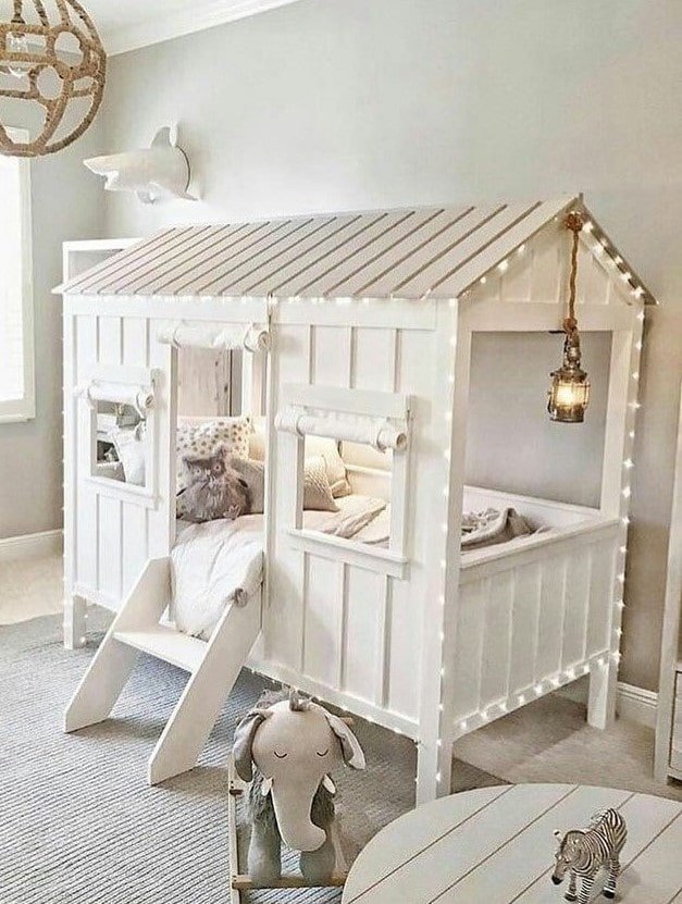 house-shaped bed in a children's room