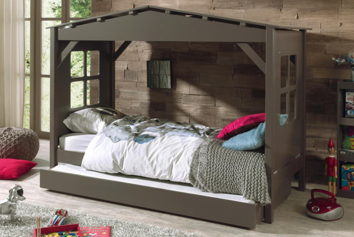 house-shaped bed in a children's room