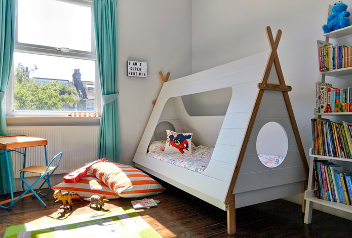 teepee-shaped bed in a nursery for a boy