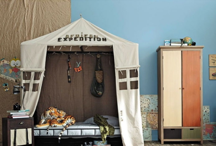 tent-shaped bed in a boy's nursery