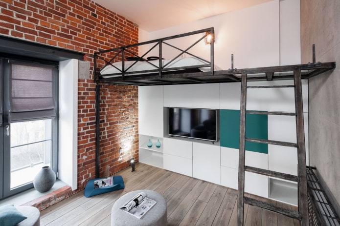 bed on the second level in the loft style