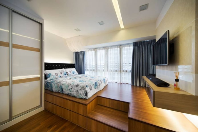 bed on a podium in the bedroom interior