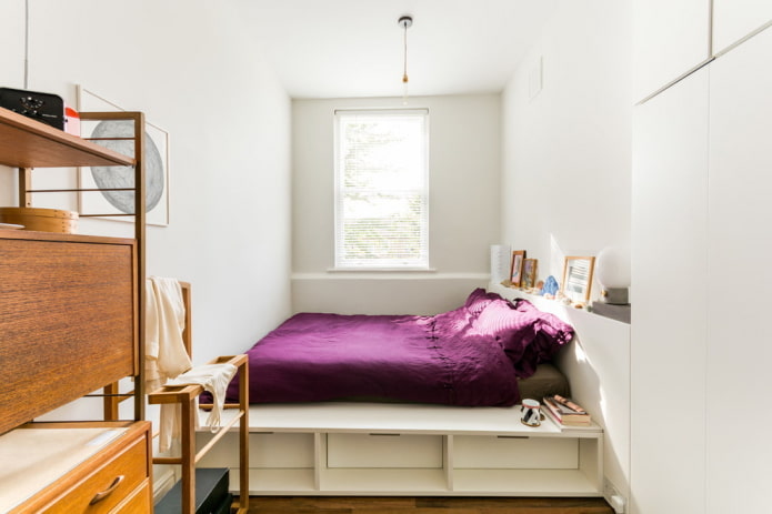 bed on a podium in the bedroom interior