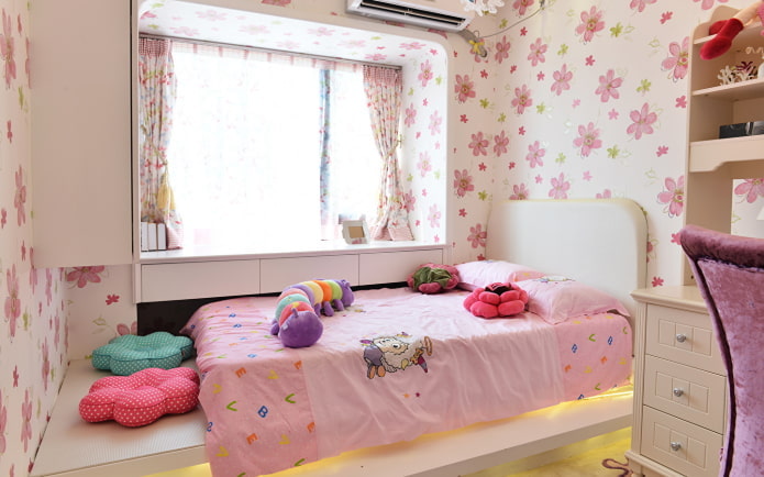 children's room with a bed by windows