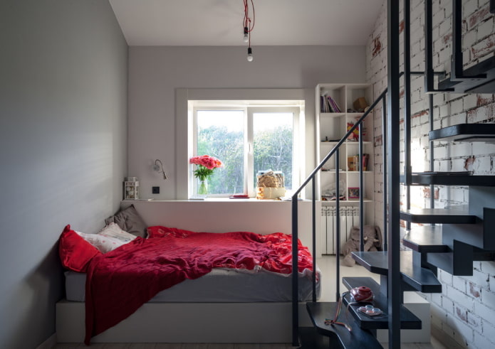 bed in a small two-story apartment