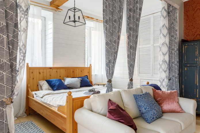 Bed separated by curtains