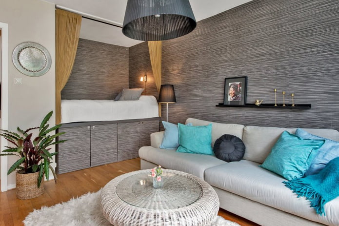 niche with a bed in a one-room apartment